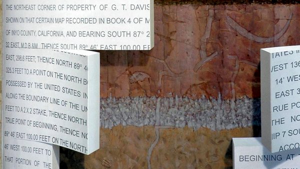 land survey on wall tablet part of trompe loeil mural by artist john pugh in bishop california